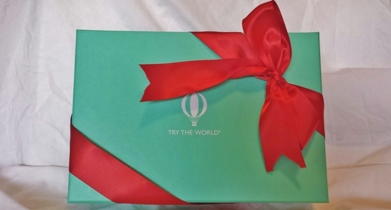 a green box with a red ribbon
