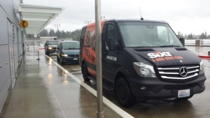 a black van with orange writing on it