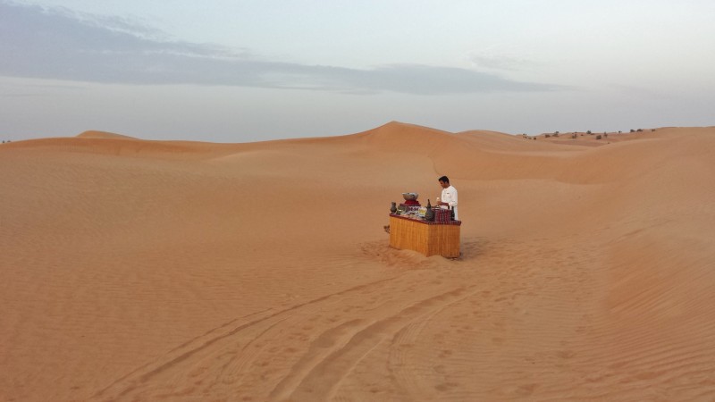 a man standing in a desert