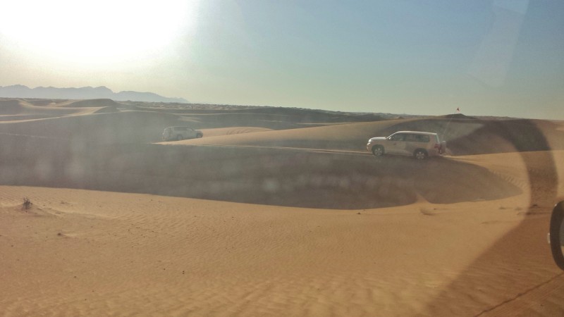Al maha desert resort dune bashing cars small dunes