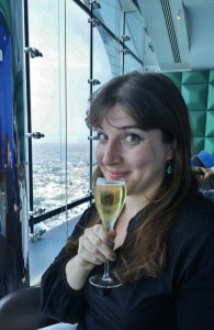 a woman holding a glass of champagne