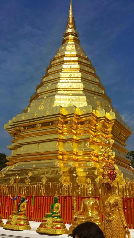 a large gold pyramid shaped building