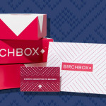 a group of boxes with a card