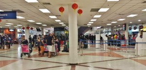 a group of people in a terminal