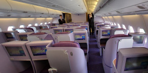 a man standing in the middle of an airplane