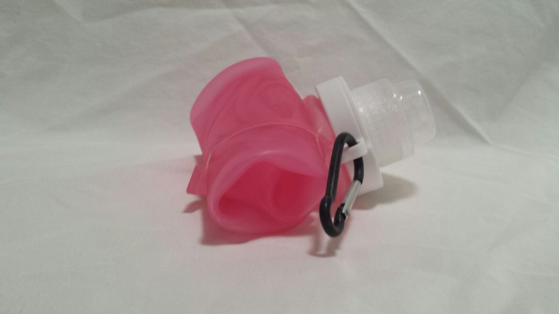 a pink bottle with a carabiner