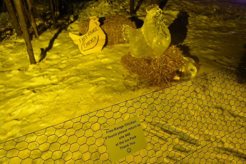 a chicken sculpture in the snow