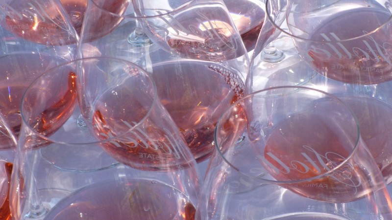 a pile of wine glasses