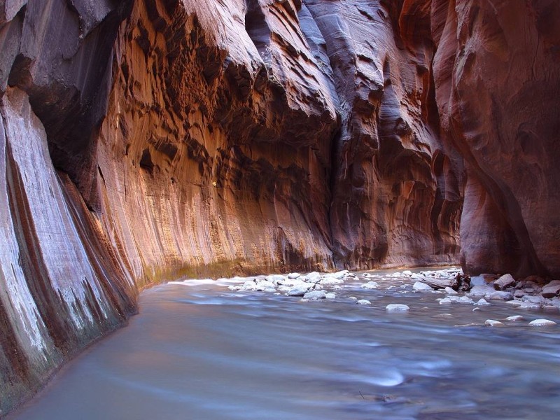 a river flowing through a canyon