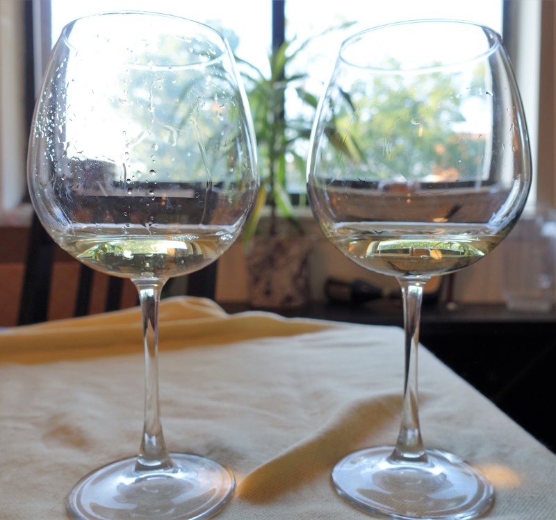 two wine glasses on a table