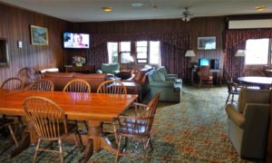 a room with a television and a table