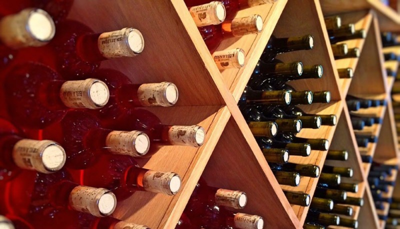 a wine bottles on a shelf