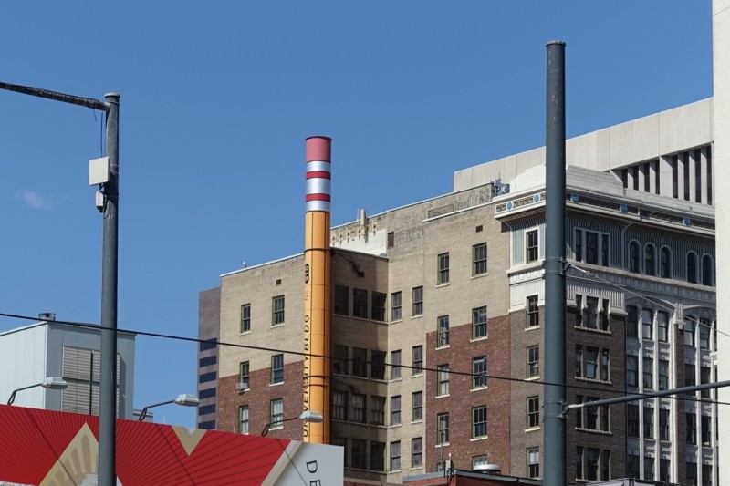 a tall building with a tall chimney