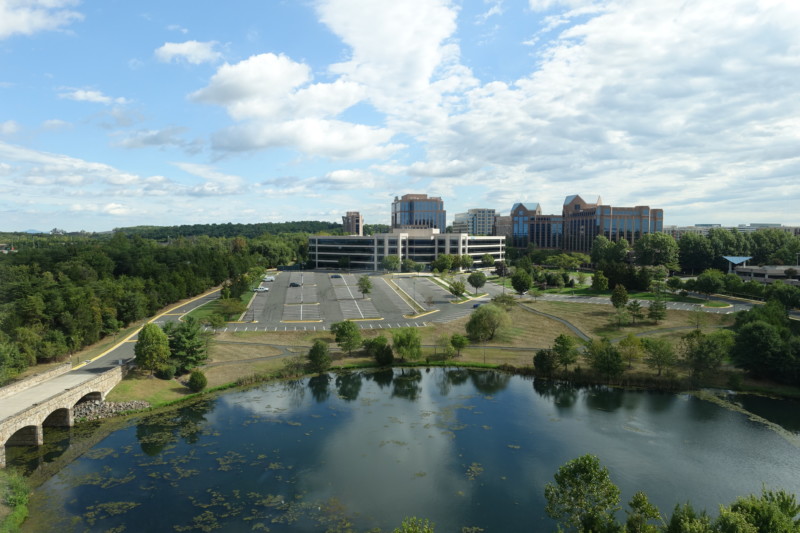 a large building next to a lake