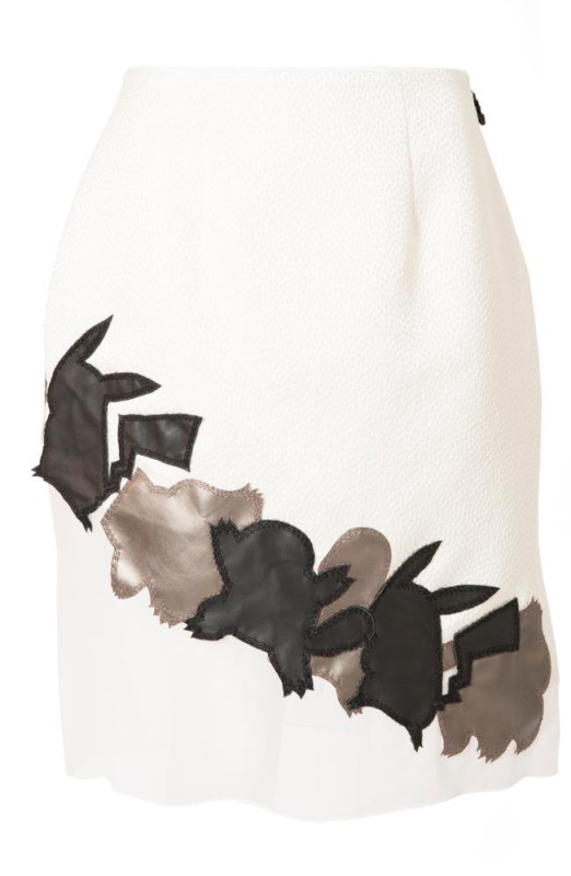 a white skirt with black and grey rabbit designs