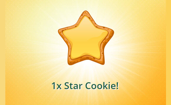 a yellow star shaped cookie with green text