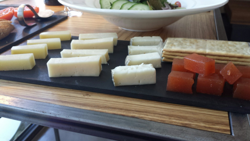 a plate of cheese and crackers