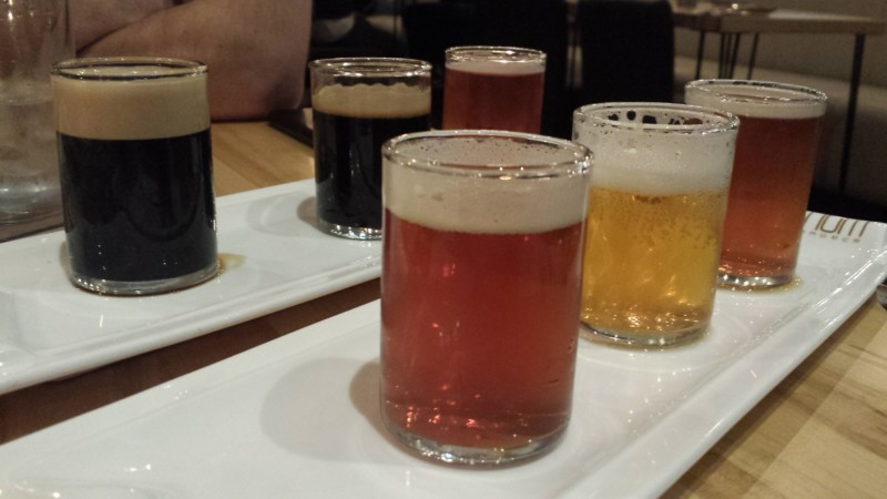 a group of glasses of beer on a table