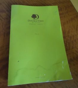 a green paper on a table