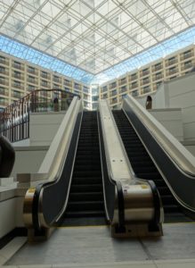 an escalator in a building