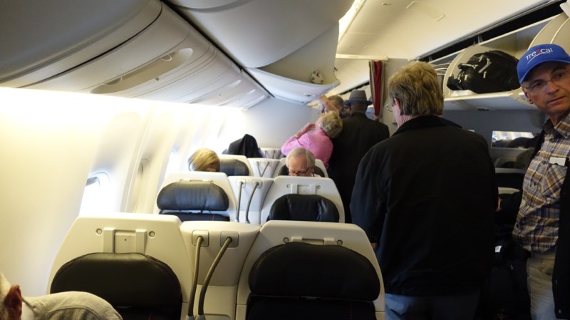 people on an airplane with passengers