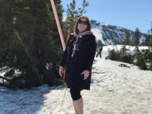 a woman standing in the snow