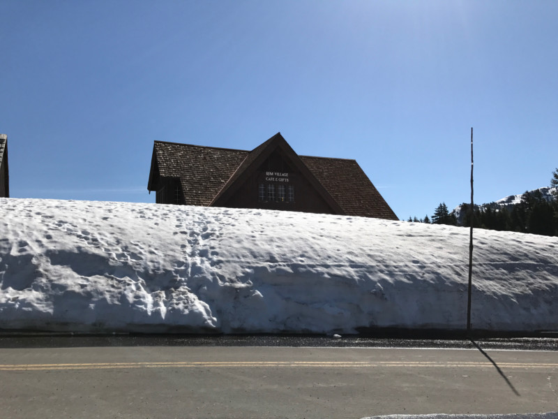 a building with a large pile of snow