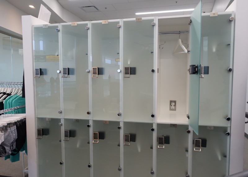 a row of lockers with doors open
