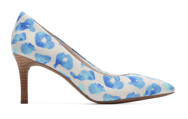 a white and blue high heeled shoe