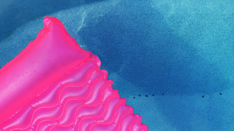 a pink float in a pool