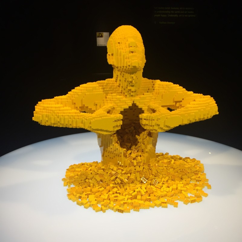 a yellow statue made of legos