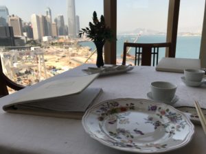 a table with a book and a plate on it