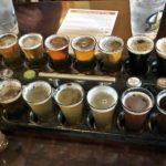 a tray of beer glasses