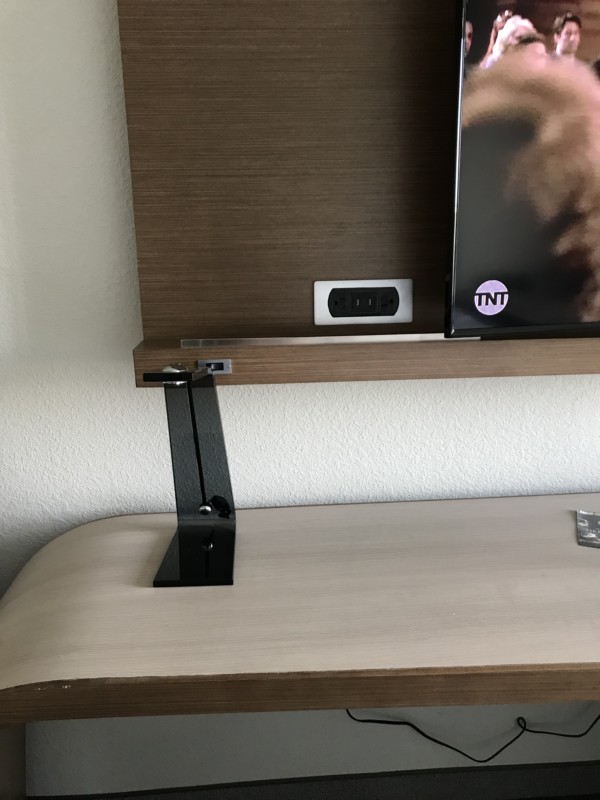 a tv on a shelf