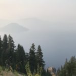 evening view of Crater Lake during wildfires