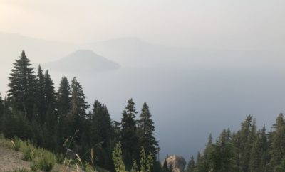 evening view of Crater Lake during wildfires