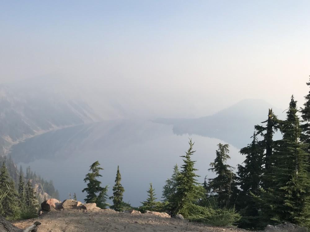 morning view of Crater Lake during wildfires